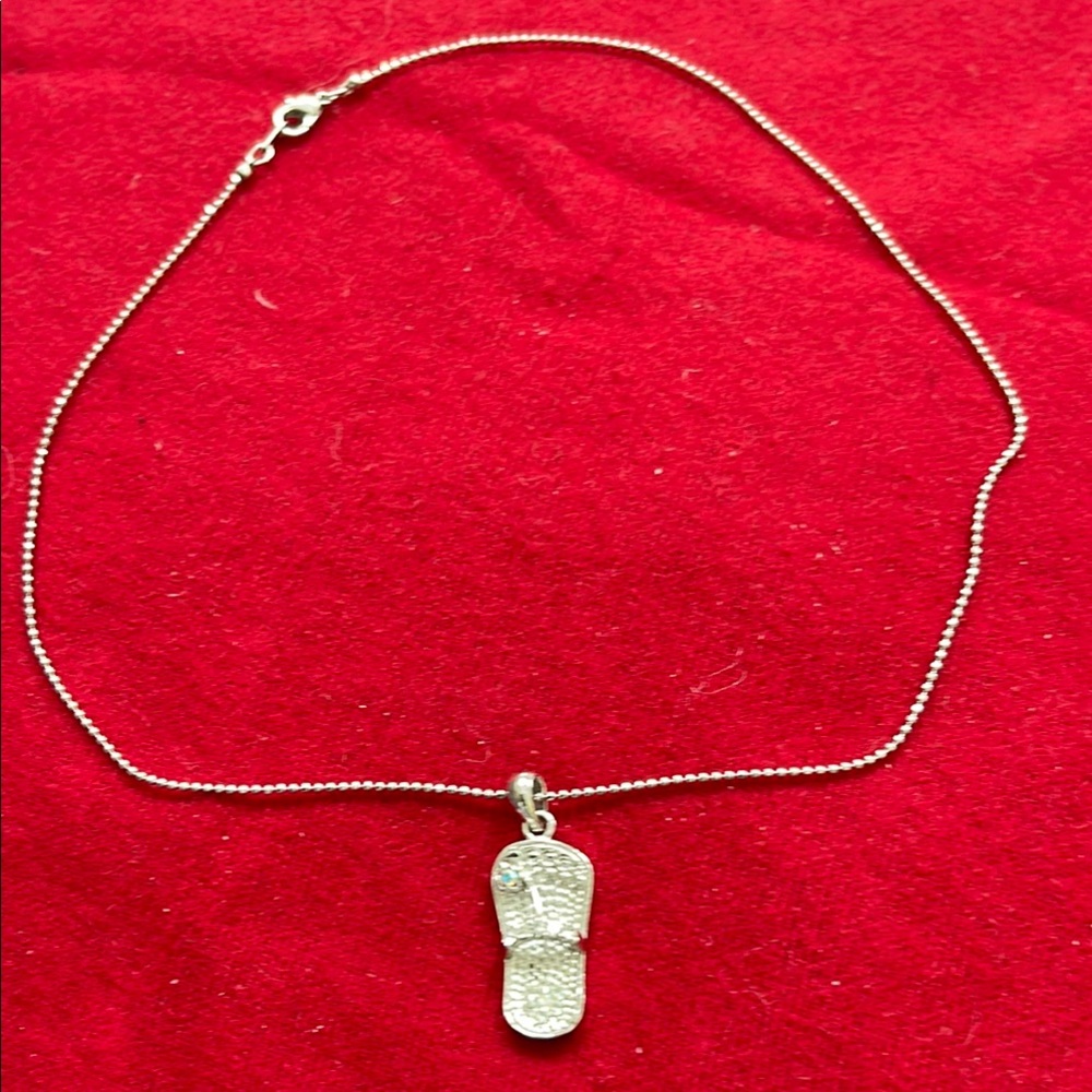 Elegant Silver Necklace with Sandal Pendant